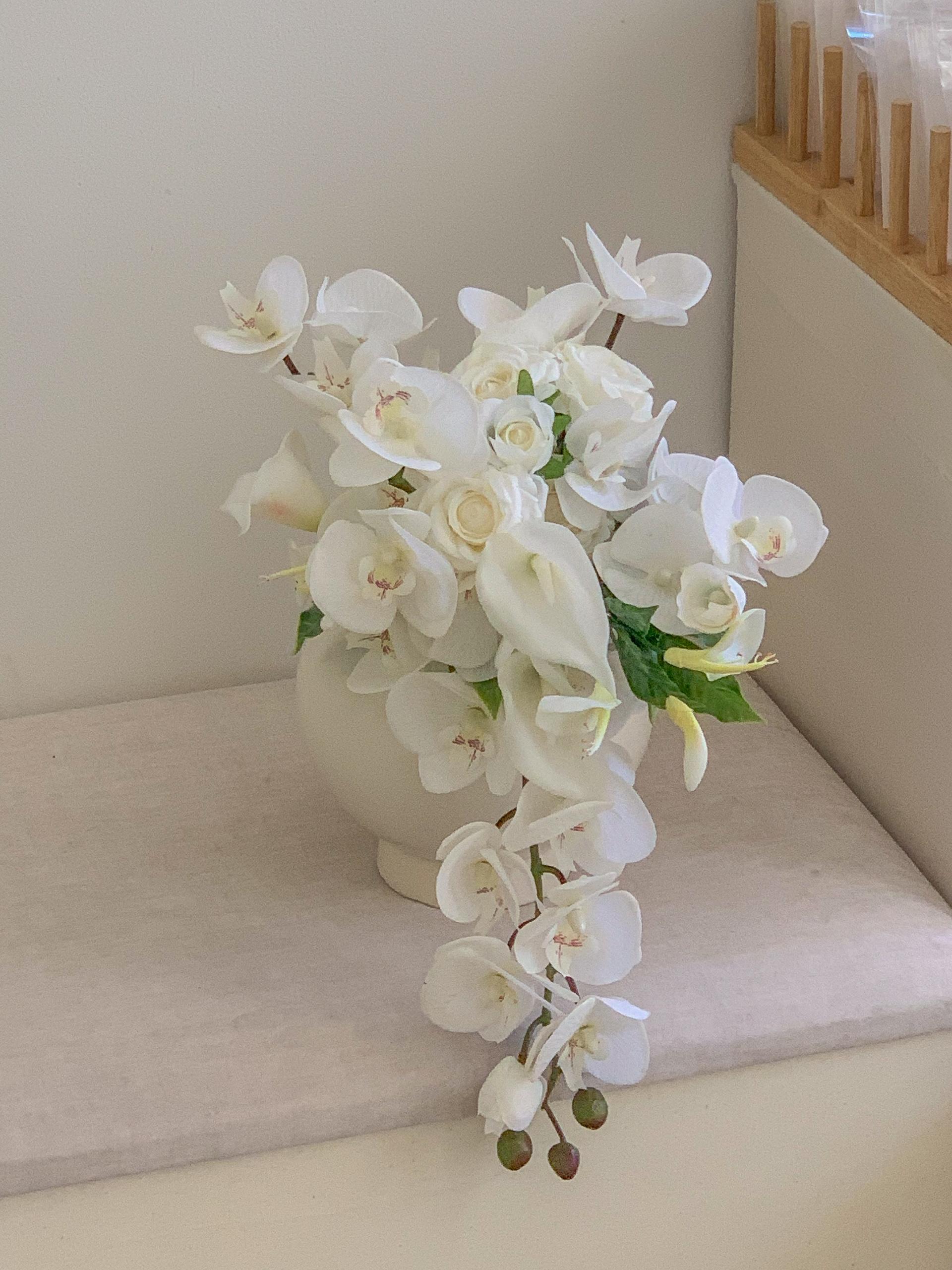 White orchid drop bouquet