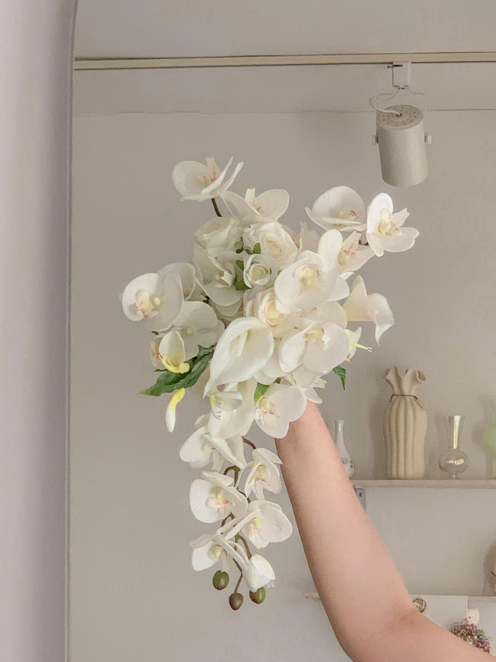 White orchid drop bouquet