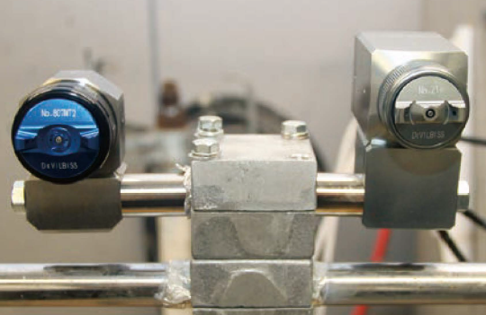 저용량 공급 자동총과의 비교