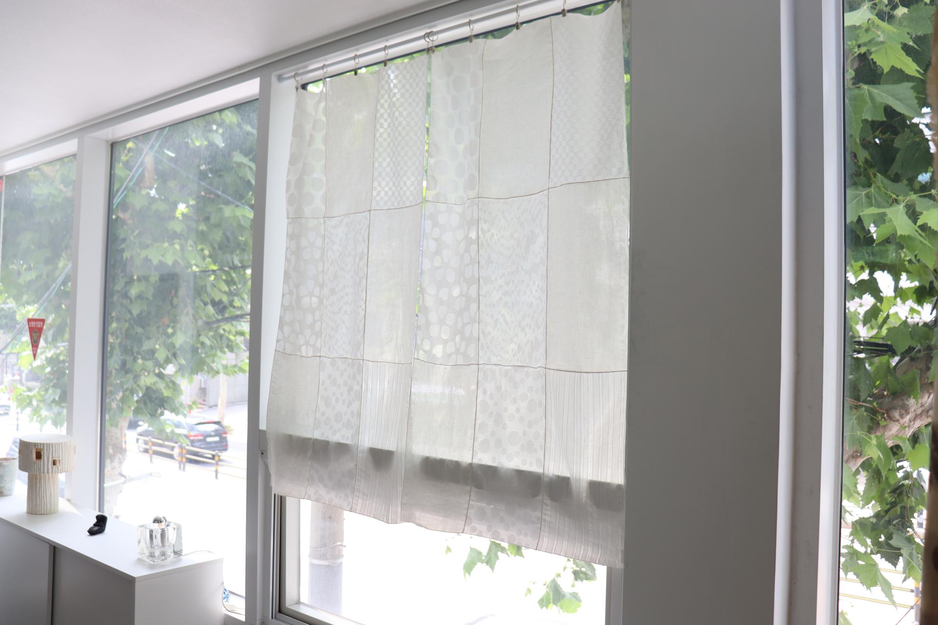 white patchwork door curtain