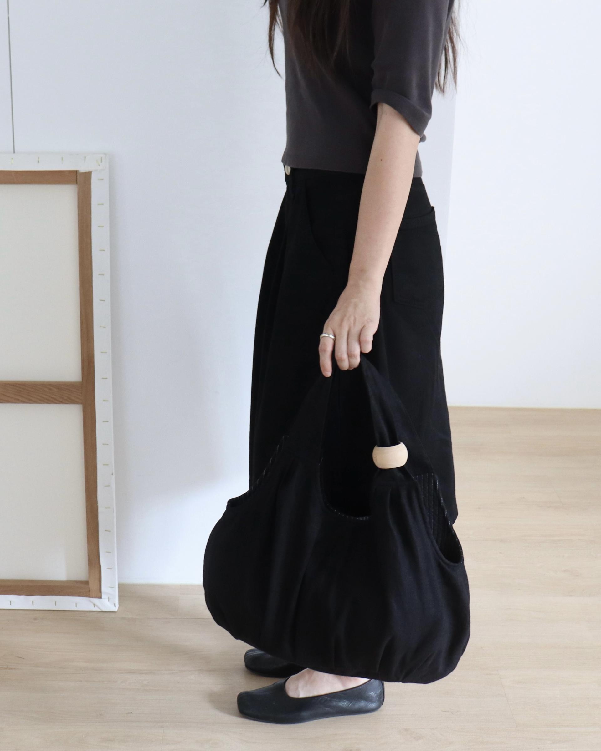 plum linen puff bag
