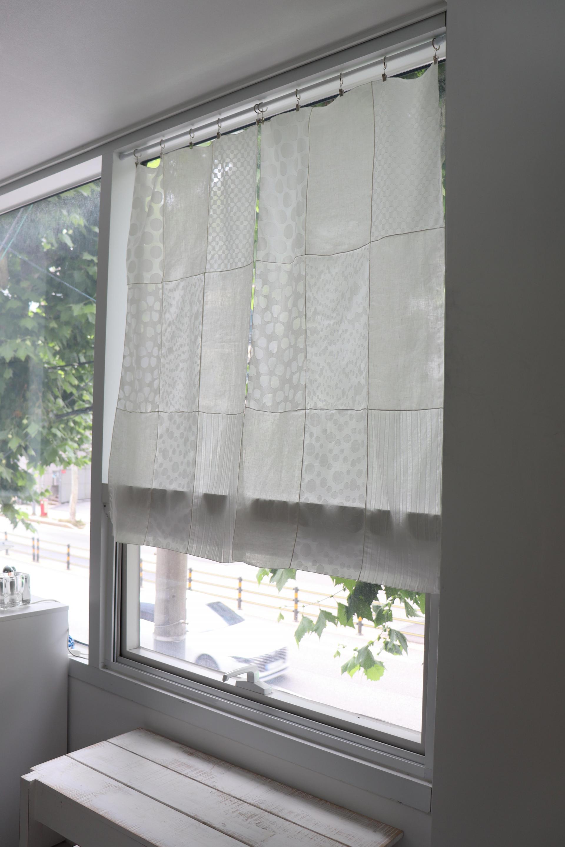 white patchwork door curtain