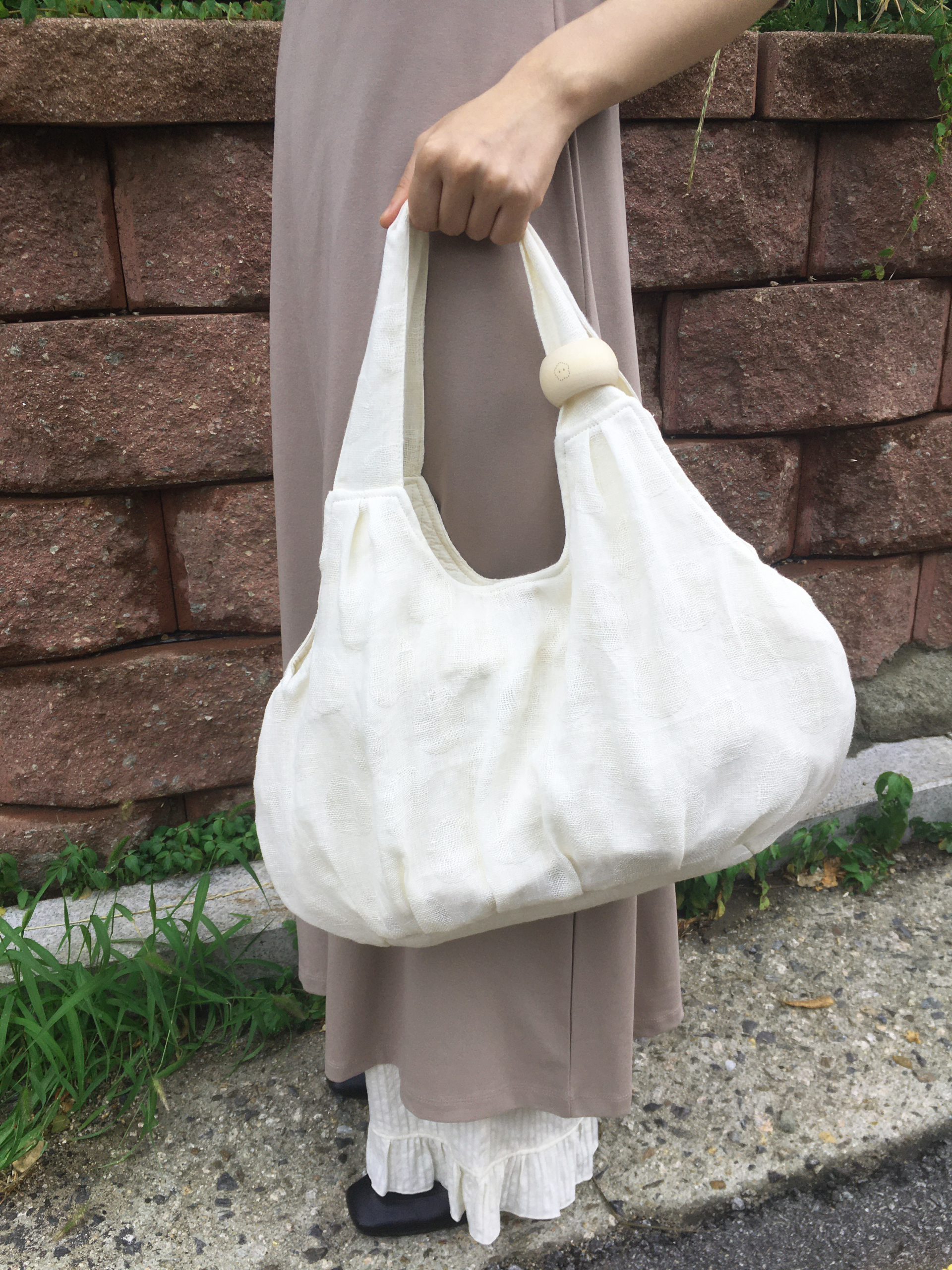 plum linen puff bag