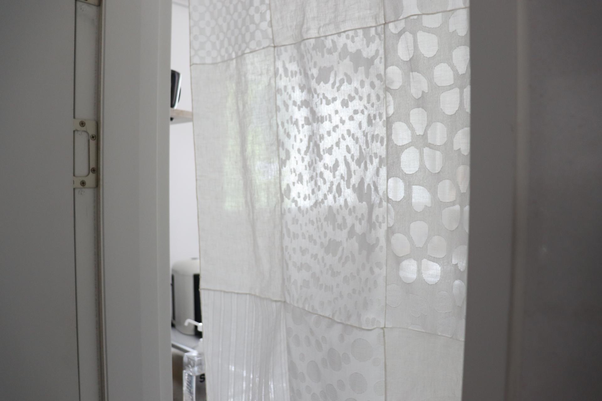 white patchwork door curtain