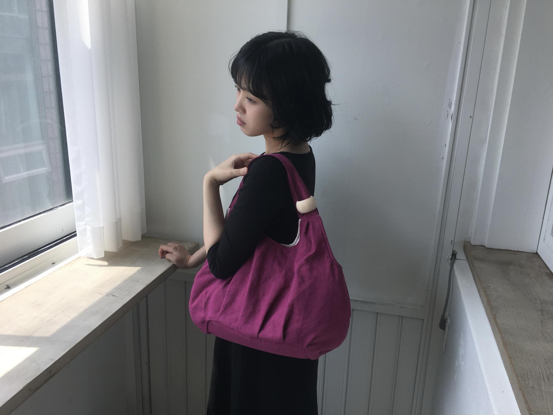 plum linen puff bag