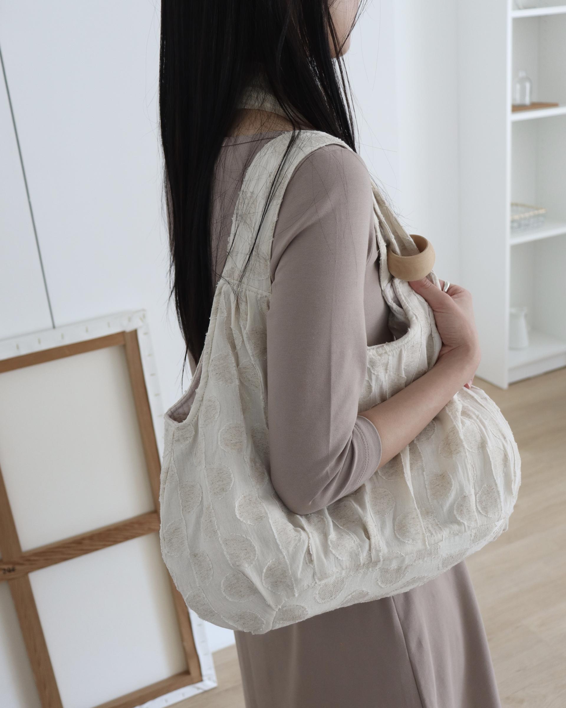 plum linen puff bag