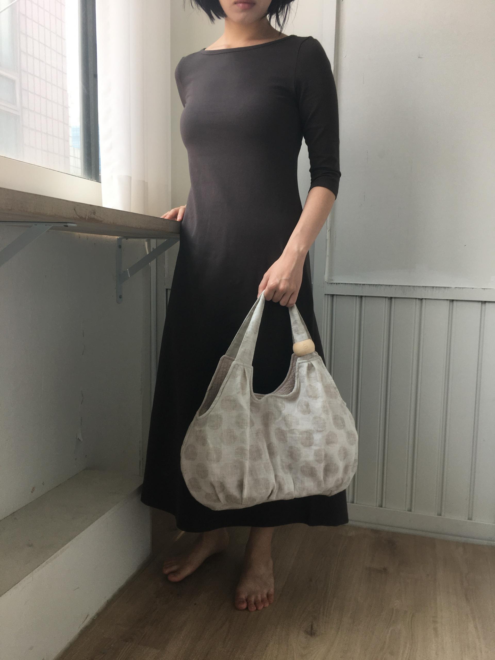 plum linen puff bag