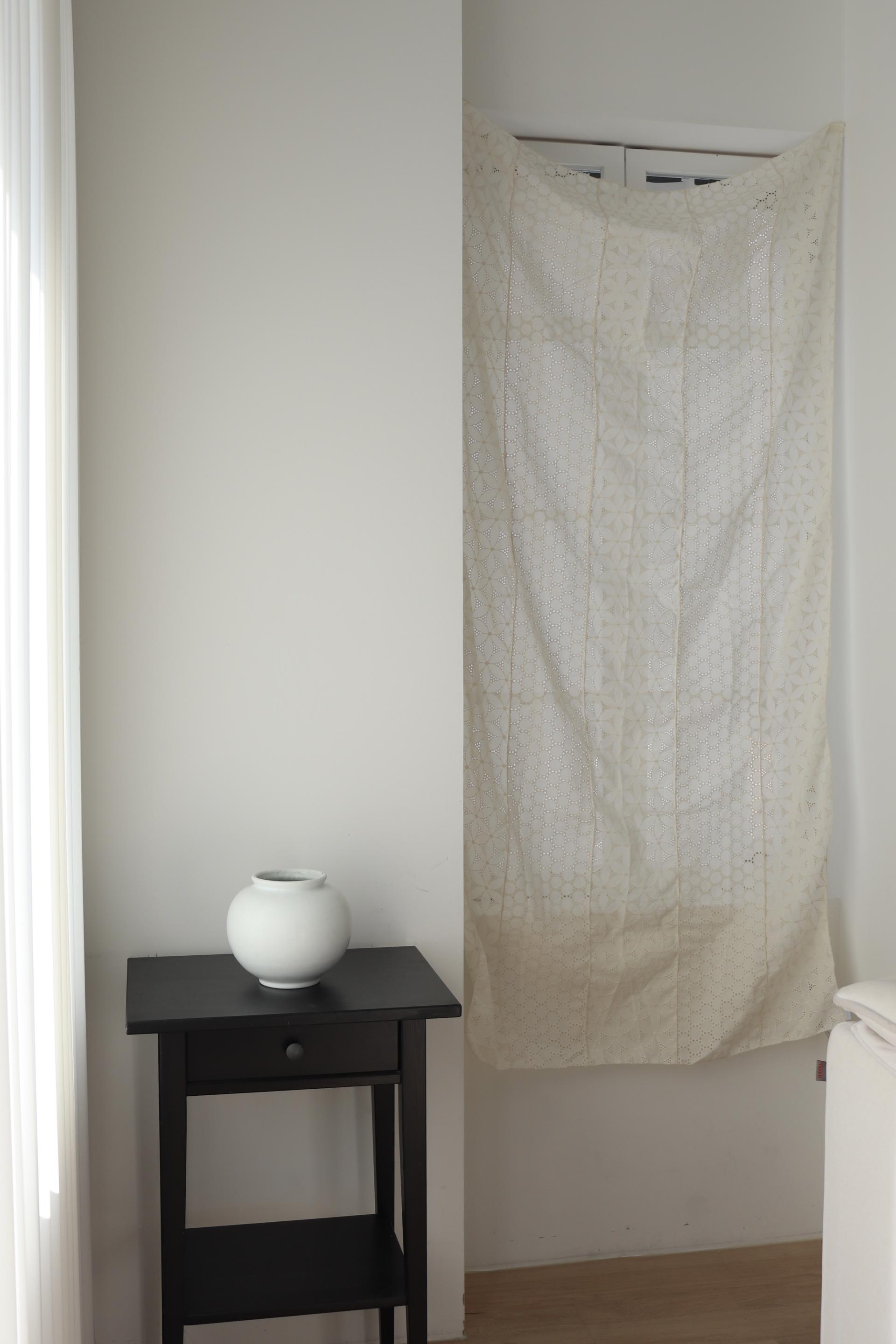white patchwork door curtain