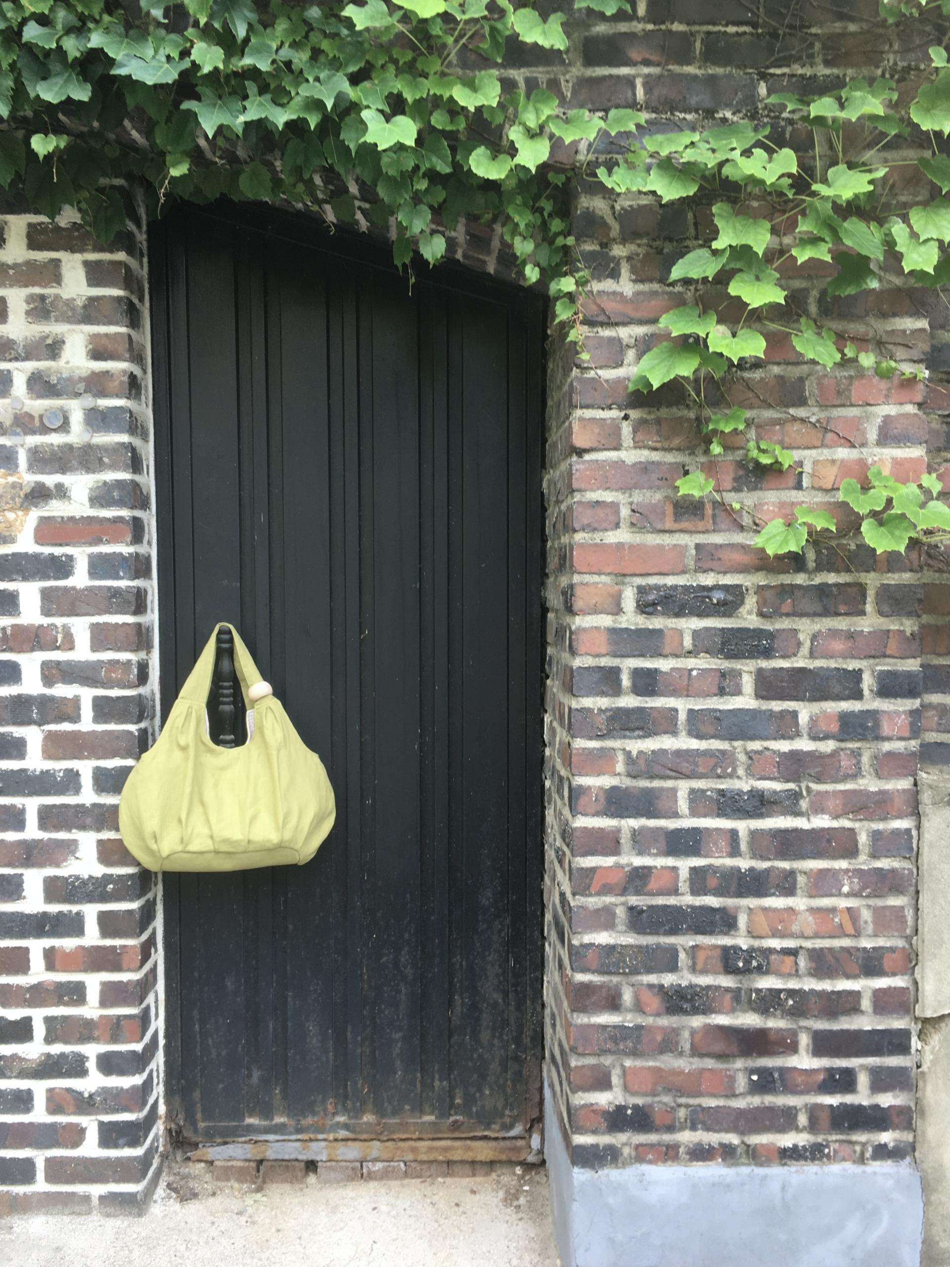 plum linen puff bag