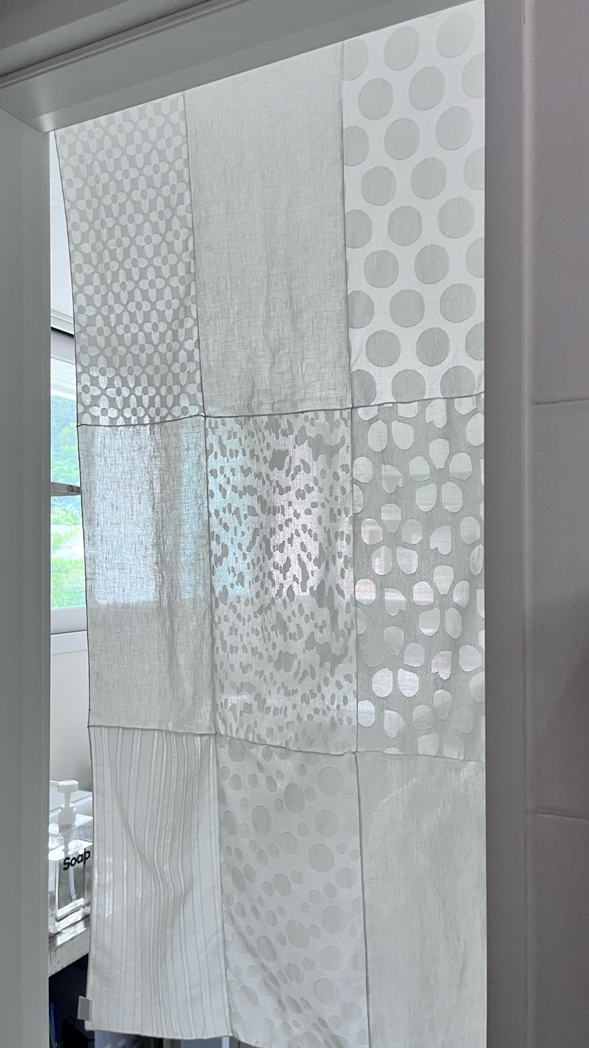 white patchwork door curtain