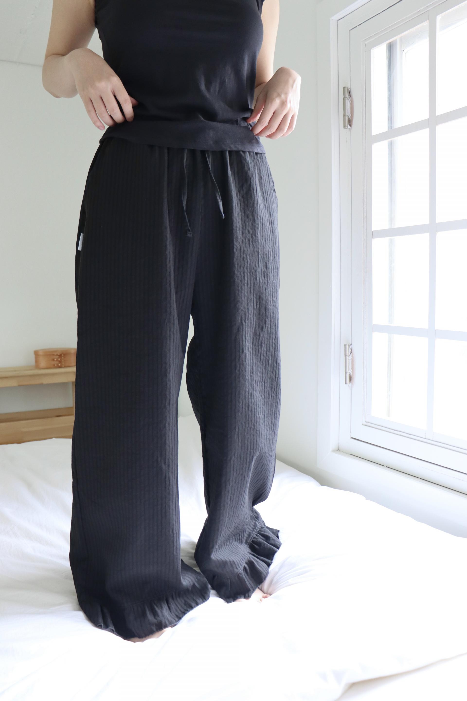 black stripe frill pants