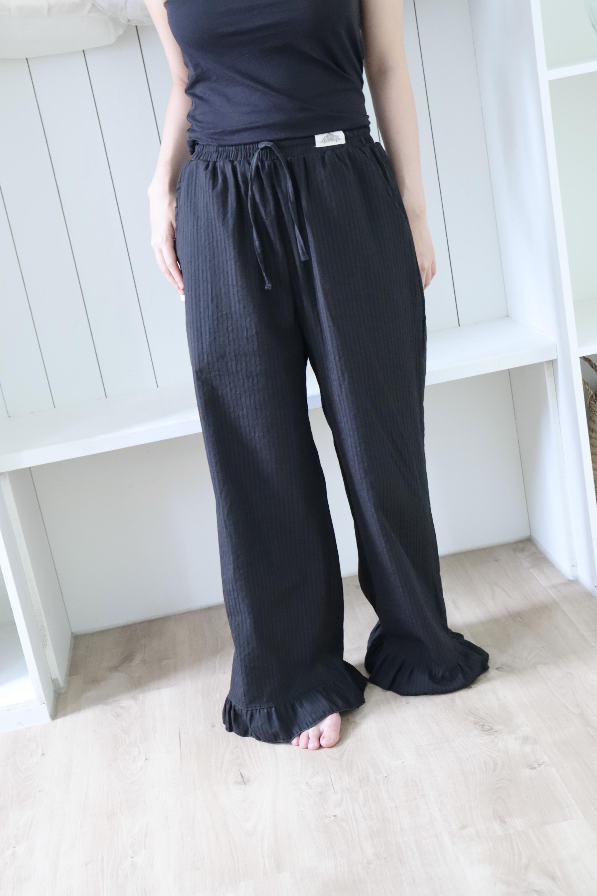 black stripe frill pants