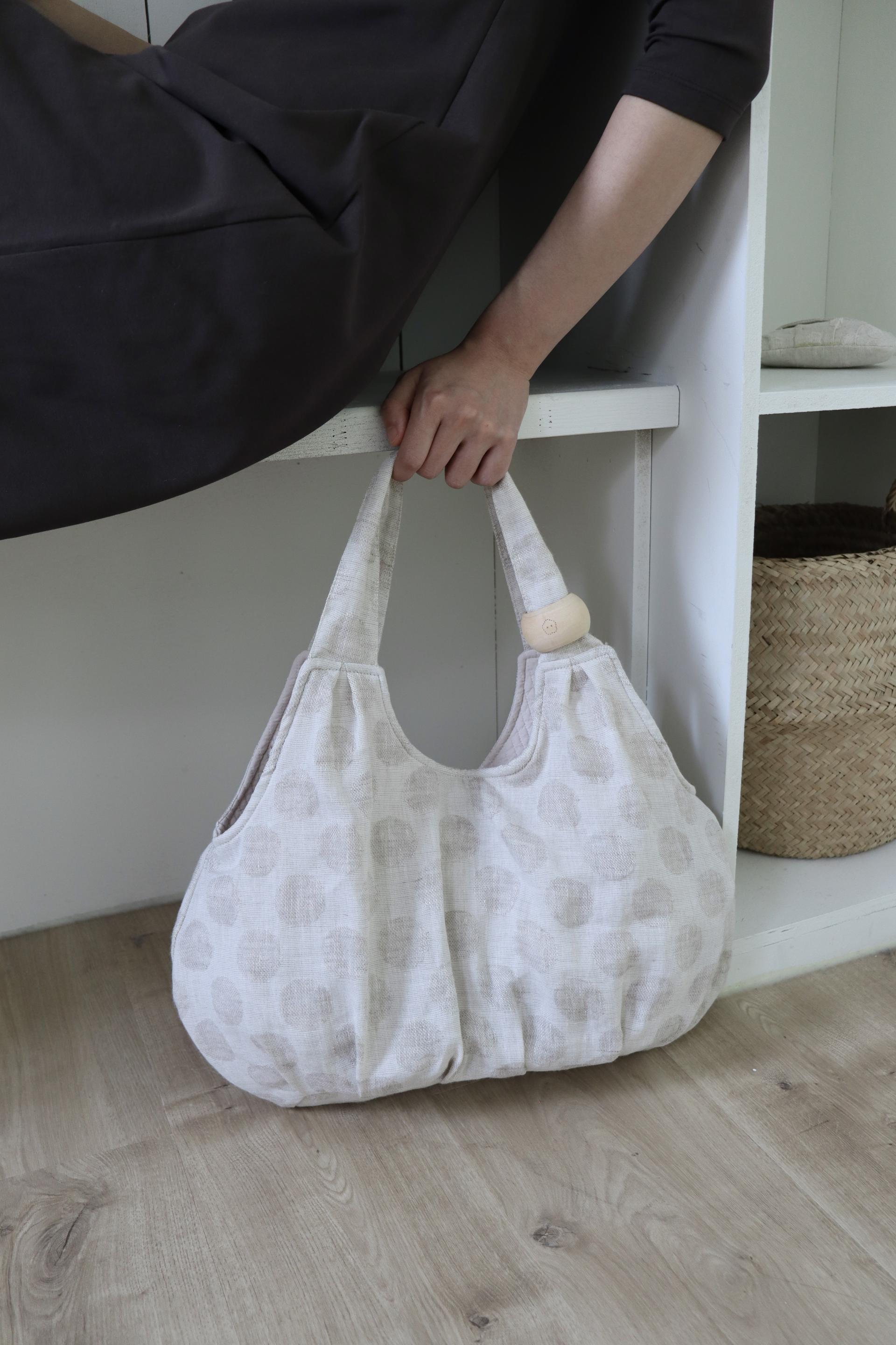 plum linen puff bag