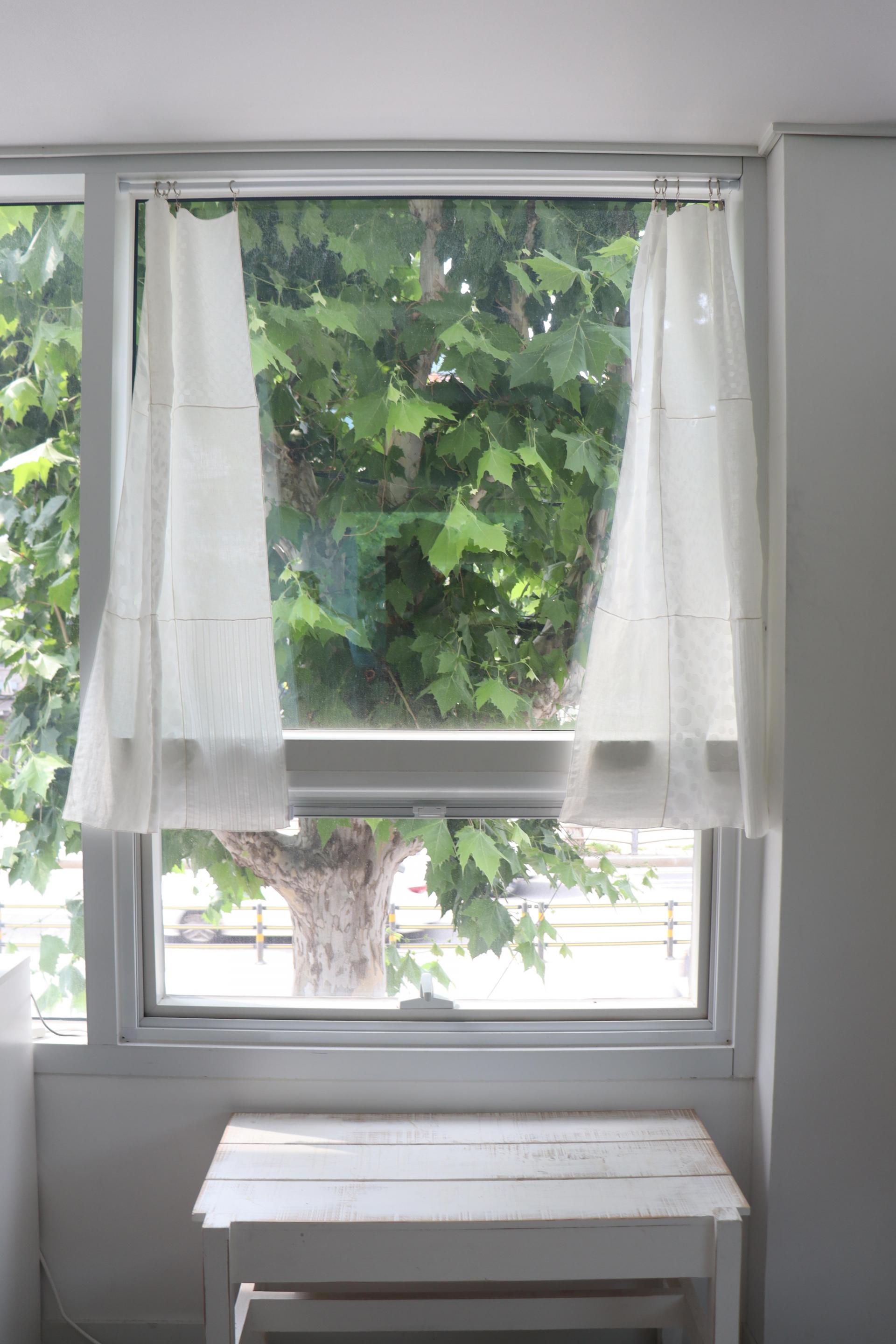 white patchwork door curtain