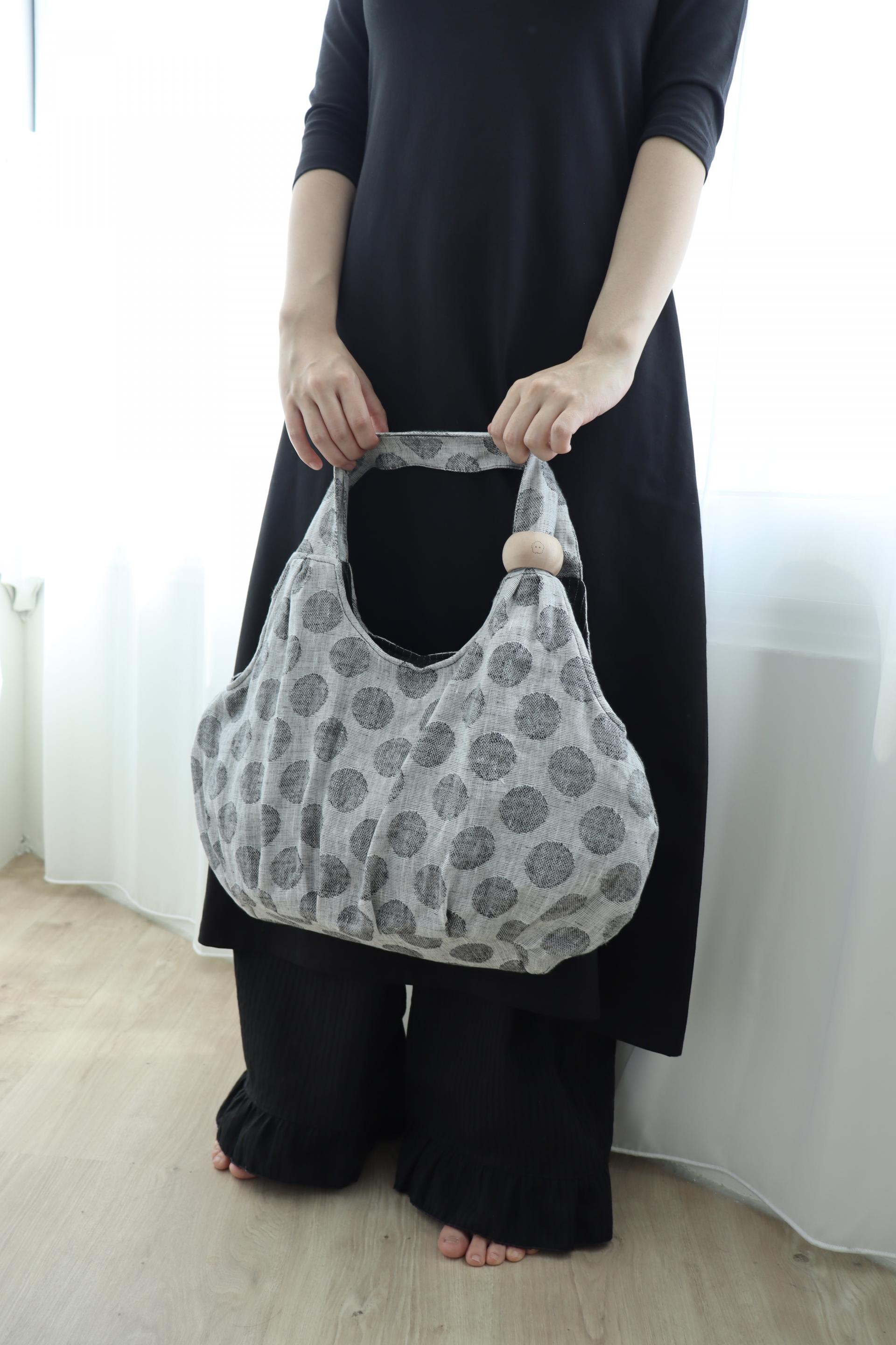 plum linen puff bag