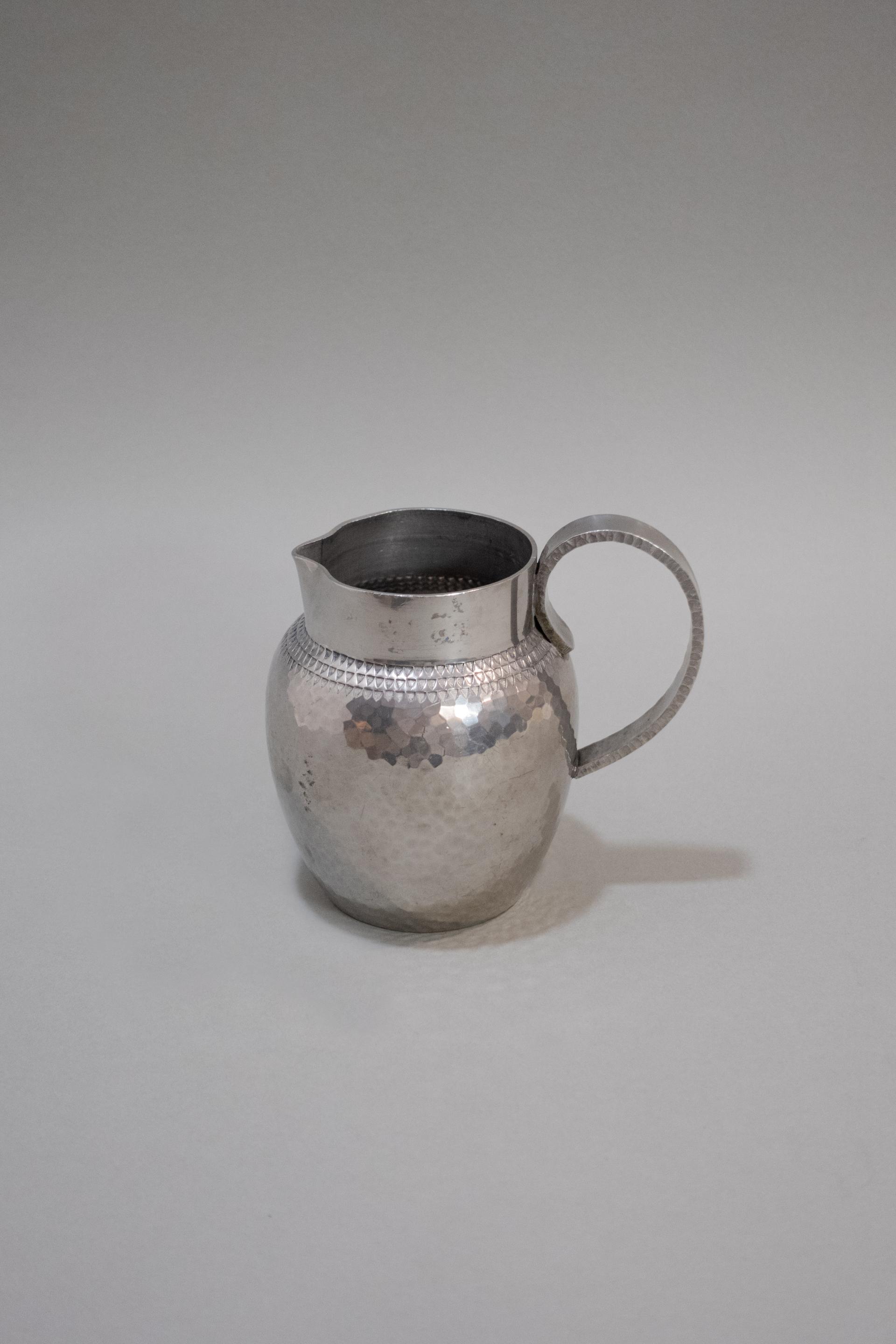 R. Delavan Art Deco Hammered Pewter Jug