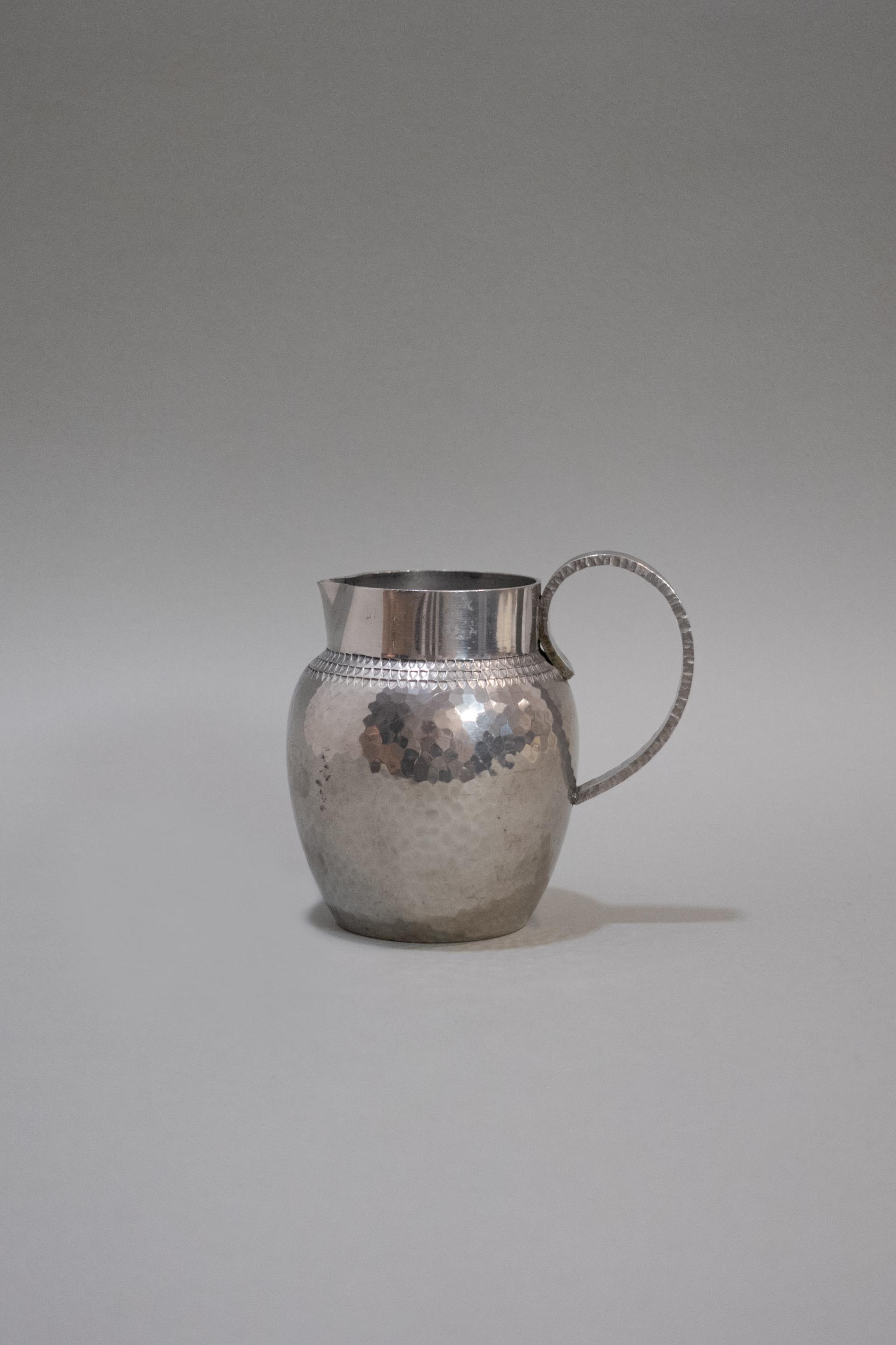 R. Delavan Art Deco Hammered Pewter Jug
