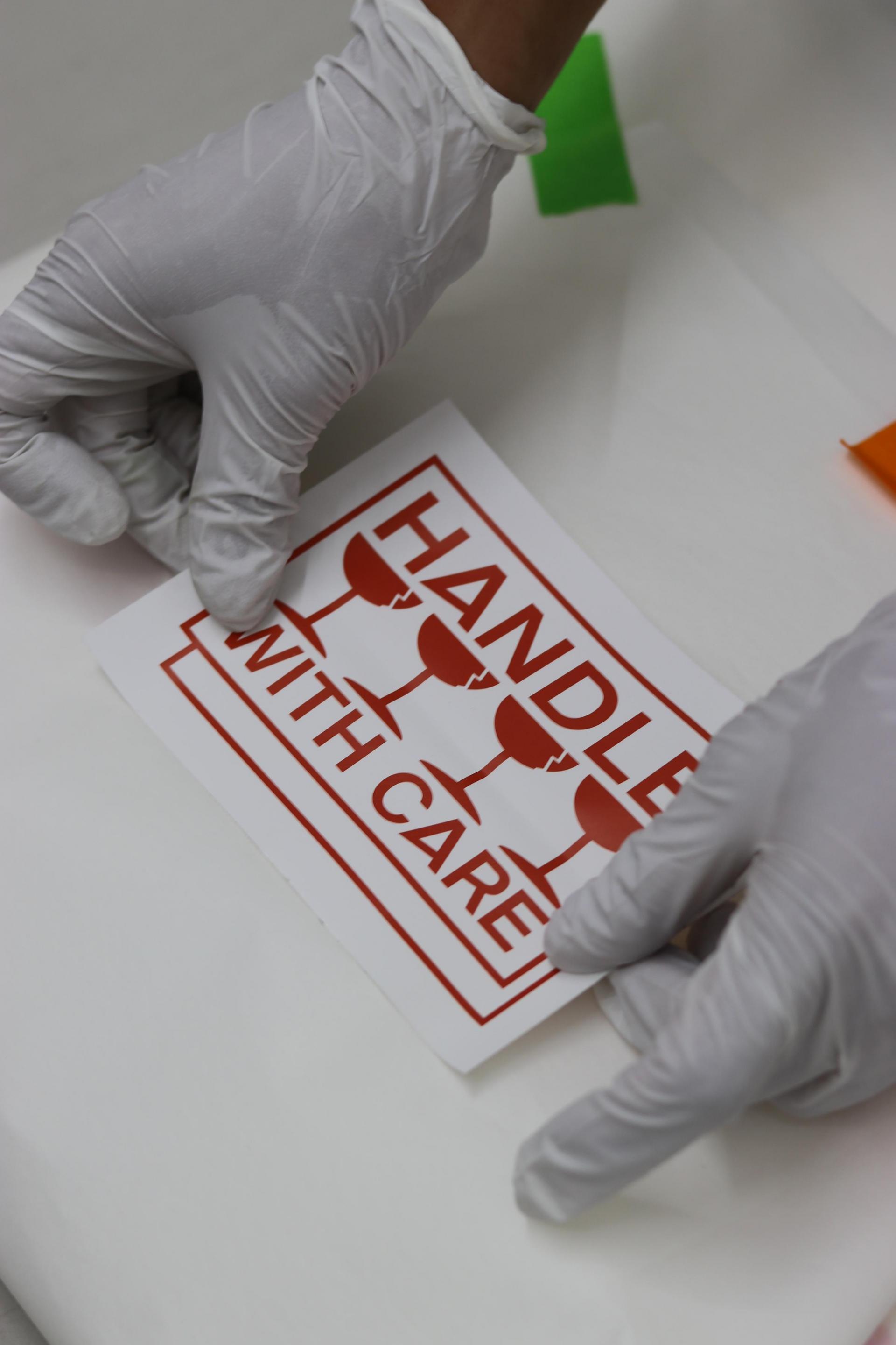 STICKER [HANDLE WITH CARE]