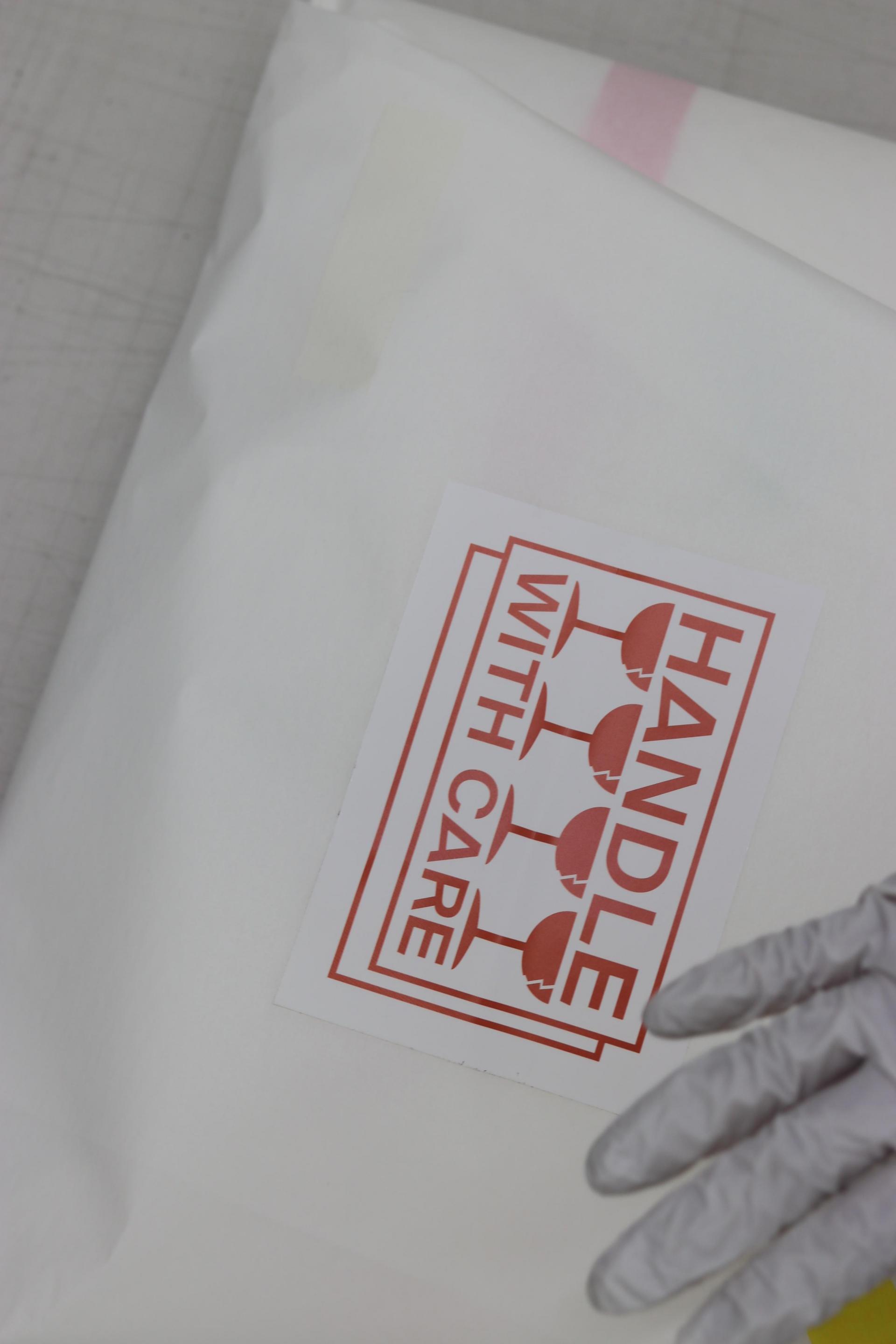 STICKER [HANDLE WITH CARE]