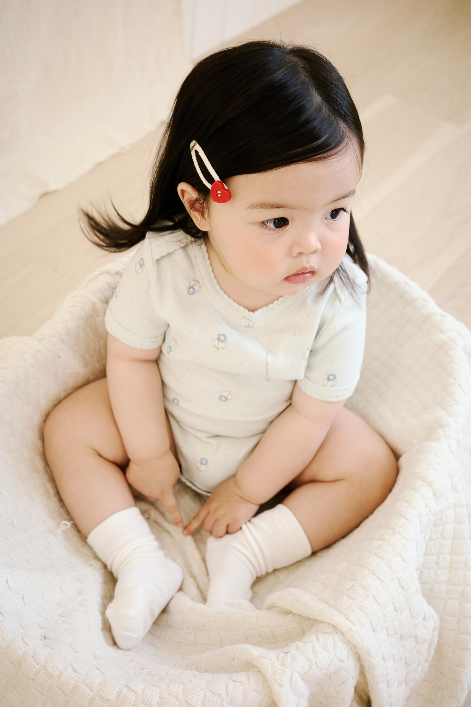 미뇽 바디수트