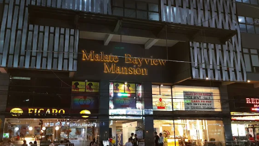 마닐라 말라테 24시간 식당 황소막창 앞 건물 마닐라 베이 뷰