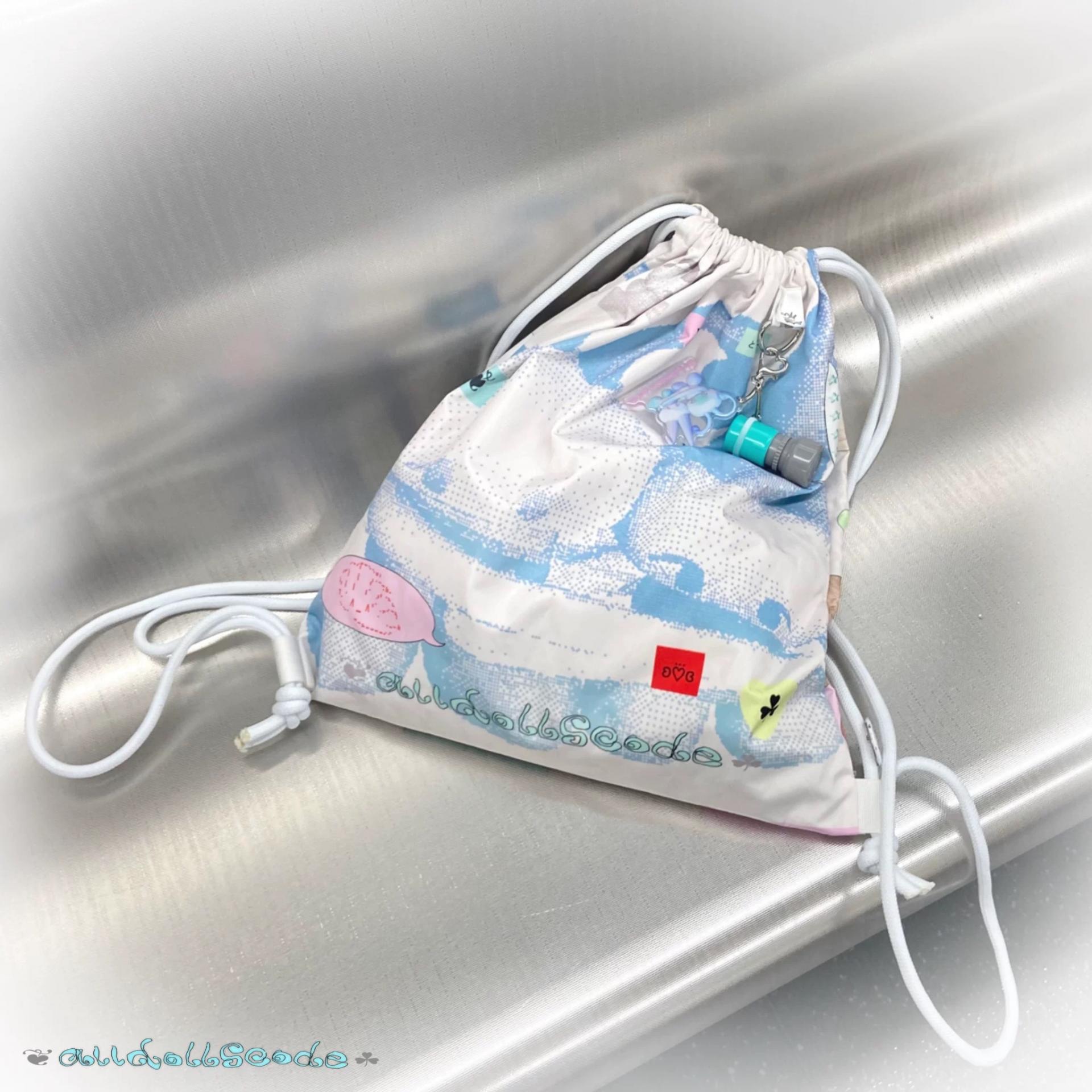 Dual-shoulder waterproof drawstring bag
