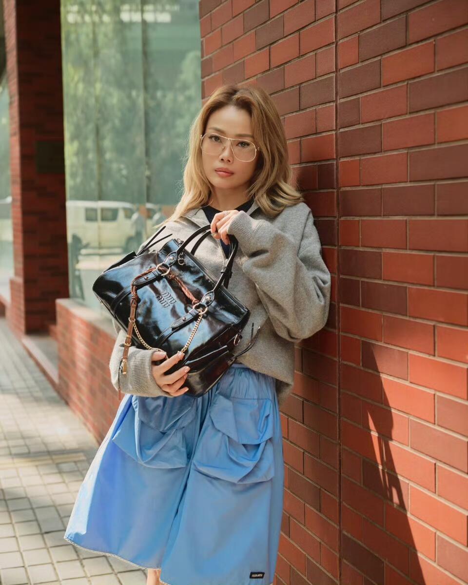 [고퀄]미우미우 2포켓 미디 스커트