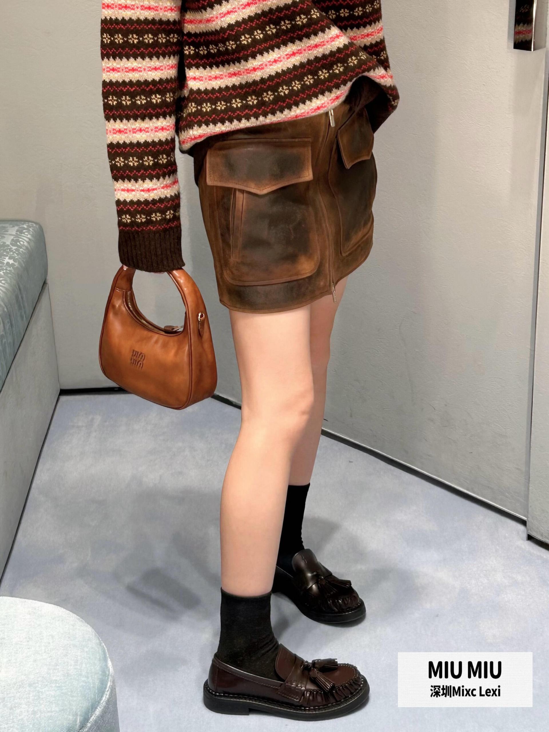 [고퀄]미우미우 빈티지 워싱 미니 스커트