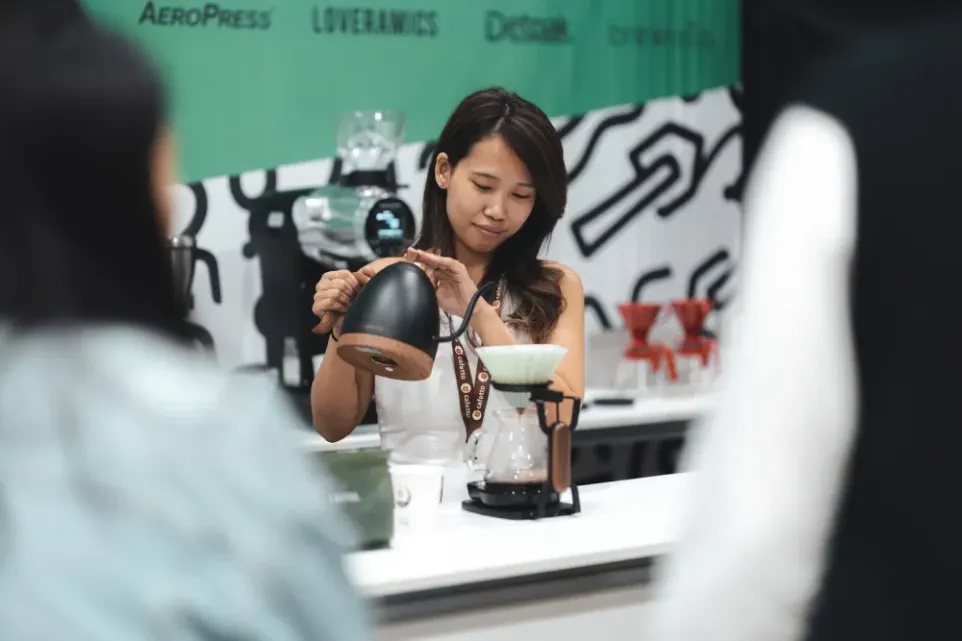 Co-founder of Homeground Coffee Elysia Tan prepares coffee using the Origami brewer.