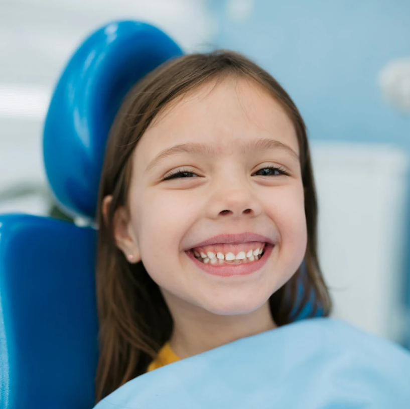 Happy child smiling after orthodontic treatment