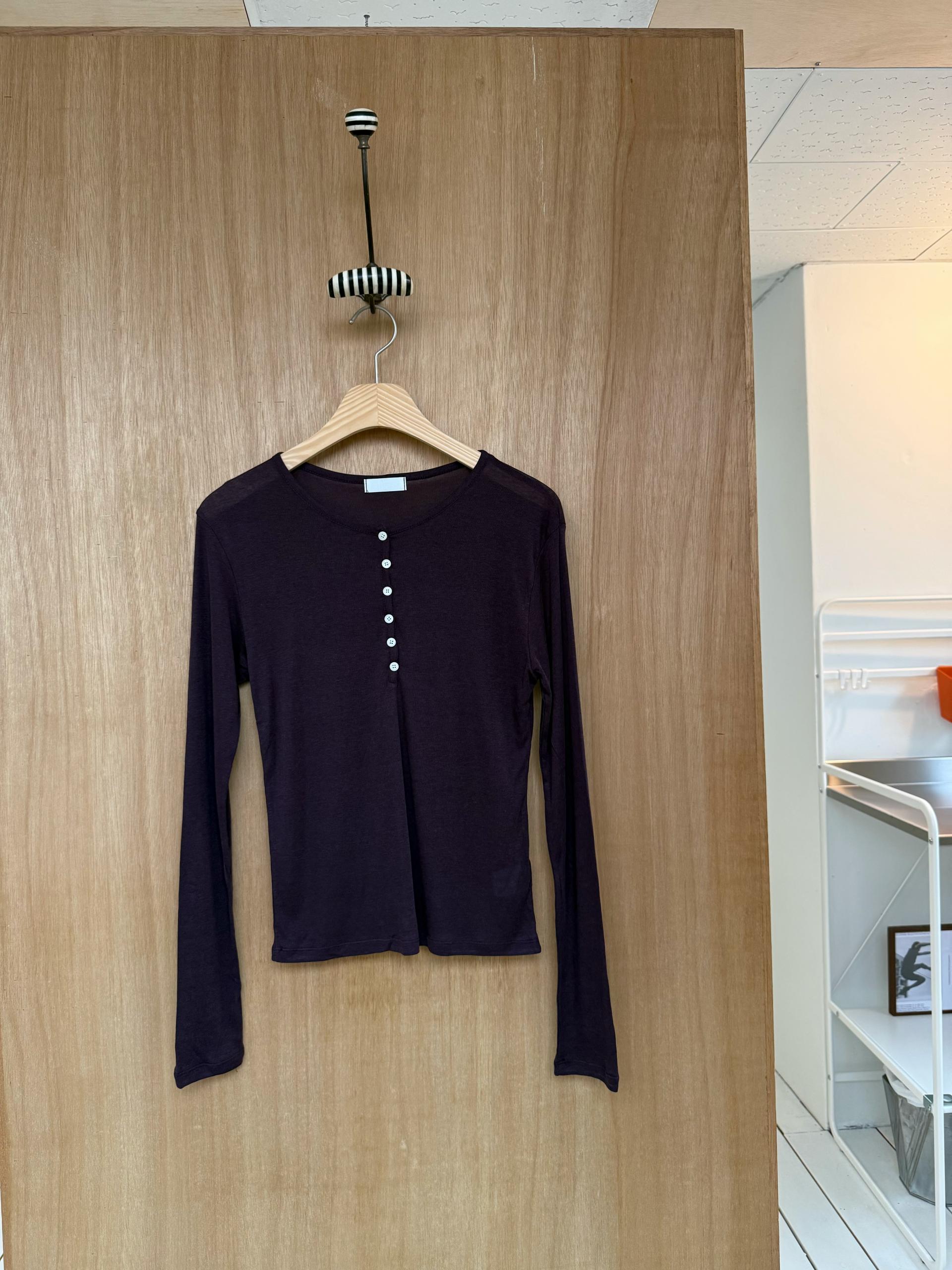 purple button long-sleeveless
