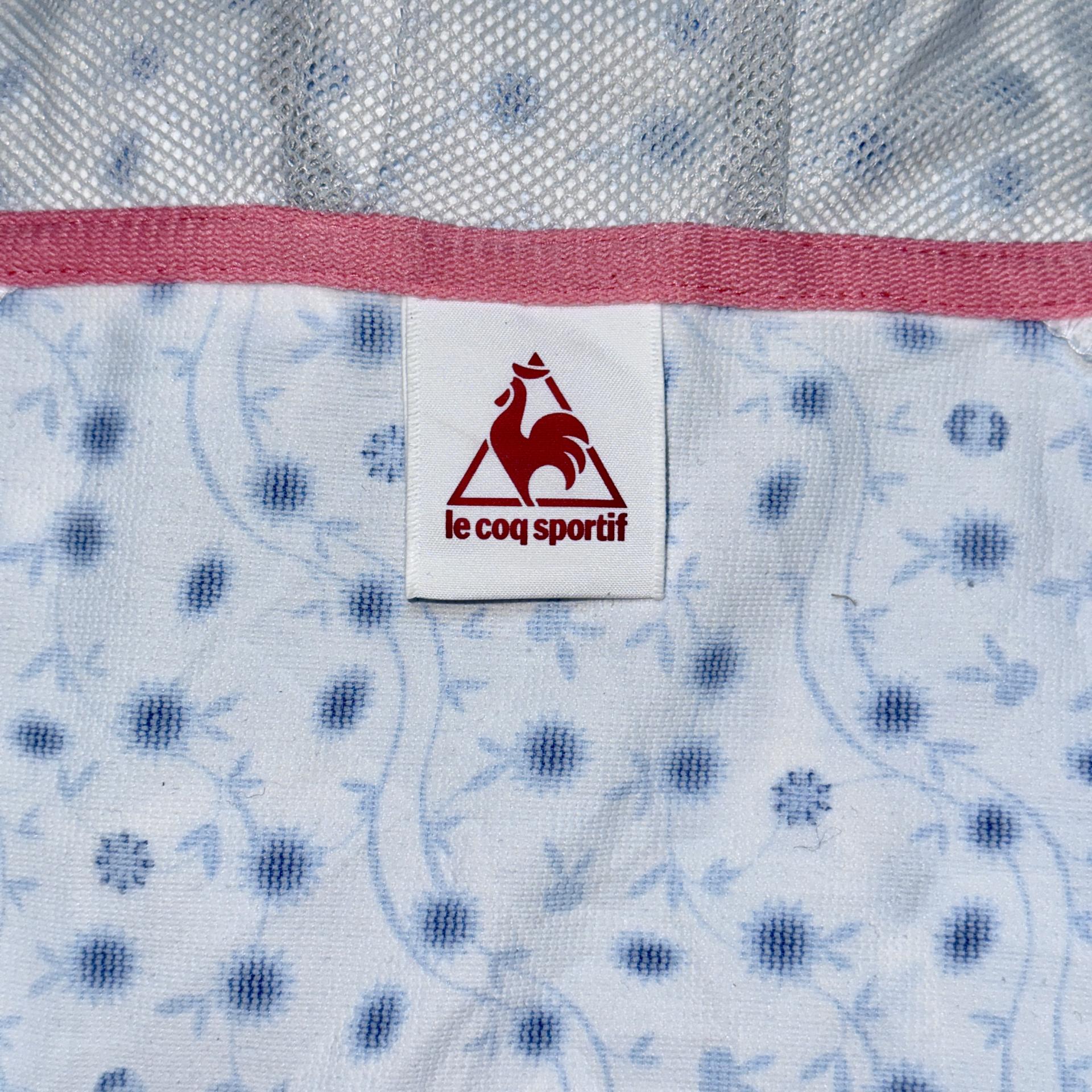 [Le Coq Sportif] 르꼬끄 플라워 그래픽 윈드브레이커 후드 집업 자켓 O (M~L)