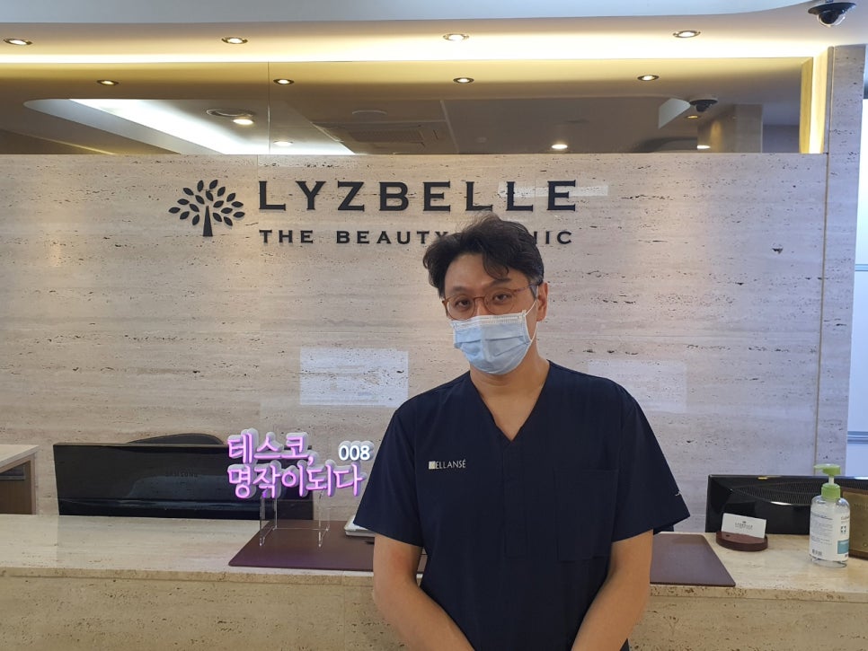 Dr. Lee with the TESSKO Becomes a Masterpiece #008 neon sign